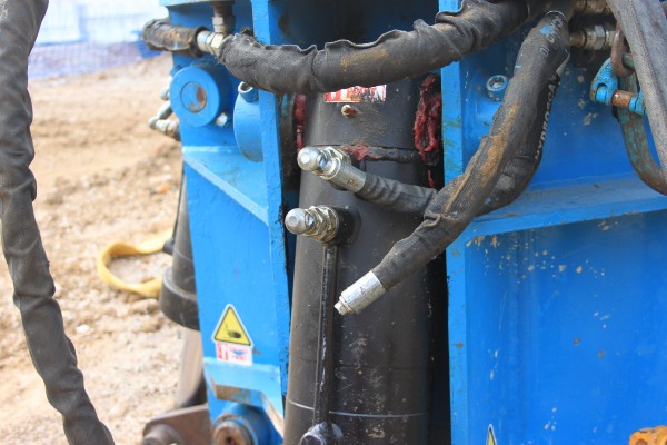 Broken hydraulic hose on demolition muncher