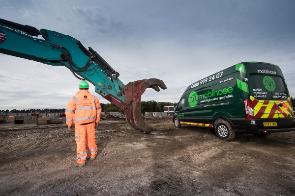 Mobihose technician attending environmental spillage issue on construction site.